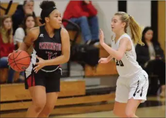  ?? KYLE FRANKO — TRENTONIAN PHOTO ?? Pennington’s Taylor Blunt, left, tries to move the ball while being defended by Hopewell Valley’s Charlotte Hare, right, during the Molinelli Classic final on Friday night.