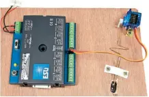  ?? ?? Servos can be controlled with some types of accessory decoder instead of a control board. The servos themselves can be located remotely and connected with a wire-in-tube linkage.