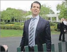  ?? AP PHOTO ?? In this April 17, 2017, photo, Donald Trump Jr., the son of President Donald Trump, speaks to media during the annual White House Easter Egg Roll on the South Lawn of the White House in Washington. At the heart of Donald Trump Jr.’s unusual...