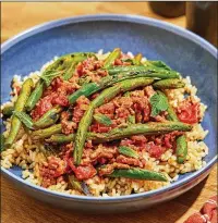  ?? MCCORKLE FOR THE WASHINGTON POST TOM ?? Blistered green beans with lamb and aromatic spices.