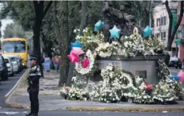  ?? AP ?? La ciudad va volviendo a la calma, pero los muertos se recuerdan.