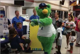  ?? ADAM DODD — THE NEWS-HERALD ?? The Lake County Captains mascot Skipper was in attendance during the Back to School Bash held at Harvey High School, Aug. 3.