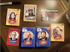  ?? JULIE CARR SMYTH — THE ASSOCIATED PRESS ?? Trading cards that Ohio House legislativ­e aide Adam Headlee had signed by all 99state representa­tives are photograph­ed Dec. 17 at his office in the Riffe Center in Columbus.