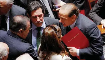  ?? LaPresse ?? In Parlamento Silvio Berlusconi e Sergio De Gregorio nel 2008