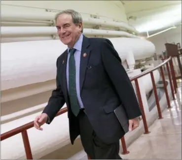  ?? J. SCOTT APPLEWHITE — THE ASSOCIATED PRESS ?? House Budget Committee Chair John Yarmuth, D-Ky., walks through the Capitol in Washington, Monday morning as President Donald Trump’s 2020 budget is delivered to his committee. Trump’s new budget calls for billions more for his border wall, with steep cuts in domestic programs but increases for military spending.