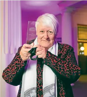  ?? JERICHO ROCK-ARCHER/STUFF ?? Wellington­ian of the Year Teresea Olsen receives her award at a ceremony in Wellington on Thursday night.