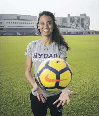  ?? Antonie Robertson / The National ?? Lyne Ismail, head coach of the NYU Abu Dhabi women’s football team and SoccHER initiative, which is open to women of all ages and experience