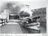  ?? Associated Press ?? n The tugboat "Geo E Lattimer" departs Lock E17 with a tow in September 1921.