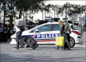  ?? AP/CLAUDE PARIS ?? A police car blocks passengers’ access to the main train station in Marseille, France, on Sunday after a knife attack.