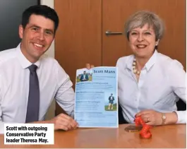  ??  ?? Scott with outgoing Conservati­ve Party leader Theresa May.