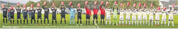  ??  ?? Showing support St Mirren and Dumbarton players held up red cards before their clash on Saturday