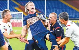  ?? Picture: Getty Images ?? RELIEF. Genoa celebrate after escaping relegation.