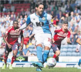  ??  ?? SPOT ON FOR ROVERS Danny Graham slots away penalty that won the game