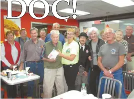  ??  ?? Howard “Doc” Ayers celebrated his birthday Friday with members of his coffee club at the Krystal in Cedartown.