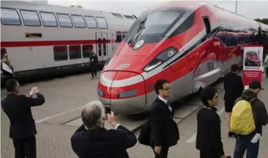  ?? THOMAS PETER/REUTERS FILE PHOTO ?? Caisse CEO Michael Sabia says Bombardier Transporta­tion will be “an even bigger” global champion thanks to investment.