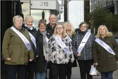  ??  ?? Unison claimants wore suffragett­e sashes outside a case management hearing at Glasgow Employment Tribunal