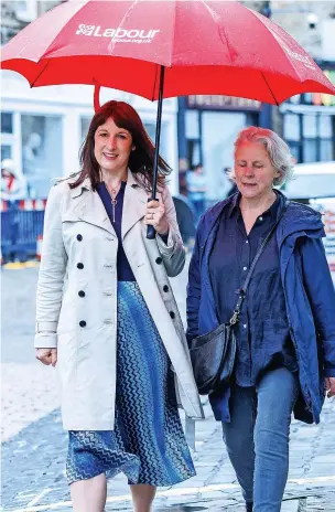  ?? Joel Goodman ?? ●●Council leader Alyson Barnes with Shadow Chancellor Rachel Reeves on the election campaign trail in Rawtenstal­l