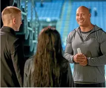  ??  ?? Dwayne ‘‘The Rock’’ John Johnson makes a brief appearance in Fighting With My Family, but the stars are the family members themselves.