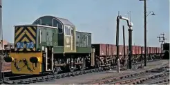  ?? J L LEAN. ?? Put to stock in September 1964 at Cardiff Canton, D9511 rapidly moved to Swansea Landore for crew training. It is seen on a job that should have been ideal for the class at Llandeilo Junction - this being a fair distance from its nominal base and thus not suited to either a trundle by diesel shunter or the use of an expensive Type 3 (the next available option at Swansea).