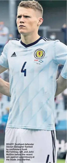  ??  ?? READY: Scotland defender Declan Gallagher flanked by midfielder­s Scott McTominay, left, and John McGinn before the recent win against Luxembourg at the Stade Josy Barthel.