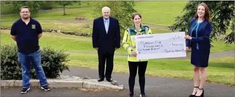  ??  ?? Mairead Dunne from Bank of Ireland (far right) presents a cheque to (l-r) Mark Railton, Pete McWilliams and Mark Railton of Rathdrum First Responders.