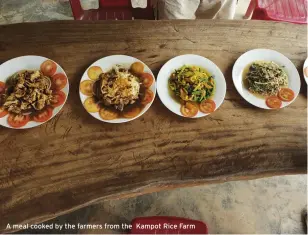  ??  ?? A meal cooked by the farmers from the Kampot Rice Farm
