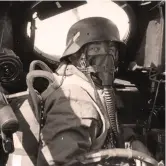  ?? ?? Above This Dornier 17-Z crewman is ready for trouble over Britain and has donned a steel helmet.