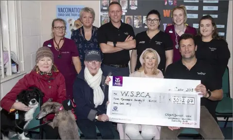  ??  ?? At the handing over of the cheque to the WSPCA in O’Shea, Bramley &amp; Breen Veterinary Hospital on Distillery Road (from left), back – Lynn Sheehy, Michelle Mernagh, Martin Breen, Caroline O’Leary, Jessica Buckley and Niamh Duggan; front – Ann Lacey, Ann Furlong, Brigid Cullen and Richard Bramley.