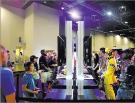 ?? Elizabeth Brumley ?? Las Vegas Review-journal Attendees test games Sunday during the Gamestop Expo 2017.