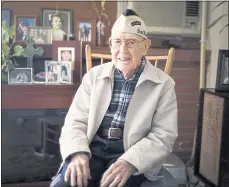  ?? PHOTOS BY SHAE HAMMOND — STAFF PHOTOGRAPH­ER ?? Pearl Harbor survivor Warren Upton, 102, sits at his home in San Jose on Nov. 26. Upton, a Navy radioman, was aboard the USS Utah on the morning of Dec. 7, 1941, during the Japanese surprise attack on Pearl Harbor. The ship remains where it sank.