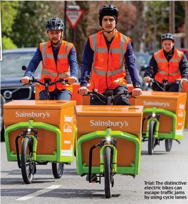  ??  ?? Trial: The distinctiv­e electric bikes can escape traffic jams by using cycle lanes