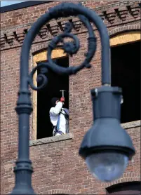  ?? Photo by Mark Stockwell ?? Work progresses on the Foster Building on Union Street in Attleboro. The former factory is being converted into apartments.