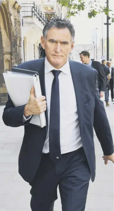  ??  ?? 0 A grim-faced RBS chief Ross Mcewan after facing a grilling from MPS over branch closure plans