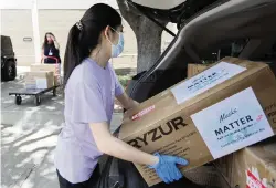  ?? TONY GUTIERREZ AP ?? Valerie Xu, 15, has raised more than $23,000, which paid for 52,600 masks for UT Southweste­rn Medical Center and a homeless shelter.