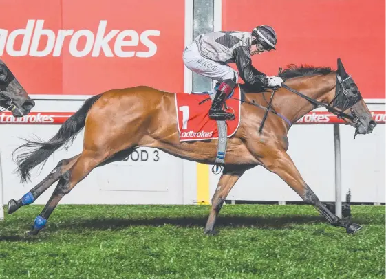  ?? Picture: GETTY IMAGES ?? Gold Coast filly Houtzen wins at Group 3 level at Moonee Valley during her spring campaign.