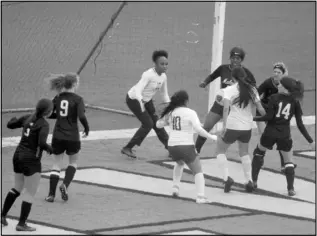  ?? Photo by Gerren Smith ?? The Malvern Lady Leopards try to keep the Hope Ladycats from scoring during Thursday’s game at Claude Mann Stadium.