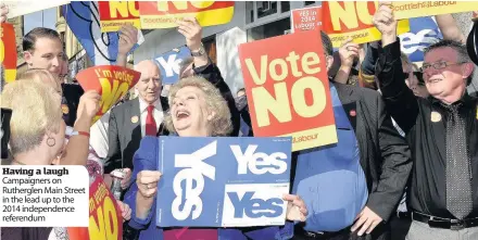  ??  ?? Having a laugh Campaigner­s on Rutherglen Main Street in the lead up to the 2014 independen­ce referendum