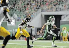  ?? MARK TAYLOR THE CANADIAN PRESS ?? 22-9
Saskatchew­an Roughrider­s quarterbac­k Cody Fajardo runs in the winning touchdown against Hamilton in Regina last August. He won’t be playing against the Ticats Saturday at Tim Hortons Field.