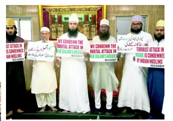  ??  ?? Indian Muslims hold placards on Friday, March 15, in Mumbai, India, during a condolence meeting and protest against Friday’s mass shootings in Christchur­ch, New Zealand. Dozens of people were killed in mass shootings at two mosques full of worshipper­s attending Friday prayers on what the prime minister called “one of New Zealand’s darkest