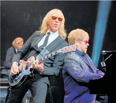  ?? Photo / Getty Images ?? Davey Johnstone and Elton John performing onstage in the US.