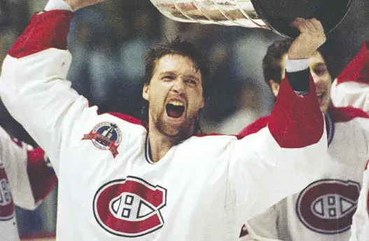 ?? JOHN MAHONEY ?? Patrick Roy holds the Stanley Cup aloft after the Canadiens won the Stanley Cup in 1993. In 1995, Roy was traded to Colorado along with captain Mike Keane.