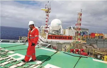  ?? Reuters ?? A worker at the Petrobras P-66 oil rig off Rio de Janeiro, Brazil. The race to protect consumers from further fuel price rises could potentiall­y impact demand growth.