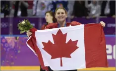  ?? PAUL CHIASSON, THE CANADIAN PRESS — ASSOCIATED PRESS FILE ?? Canada’s Hayley Wickenheis­er celebrates after winning gold in the 2014Winter Olympics in Sochi, Russia.