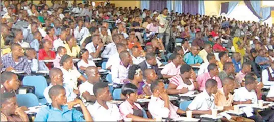  ??  ?? Undergradu­ates in a lecture room
From Iyabo Lawal ( Lagos) Lawrence Njoku ( Enugu), Rotimi Agboluaje ( Ibadan), Oluwaseun Akingboye ( Akure) and Monday Osayande ( Asaba)