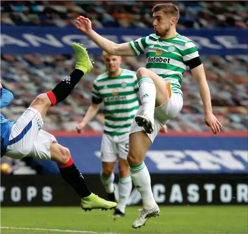  ??  ?? Steven Davis pulls off an overhead kick to open the scoring at Ibrox