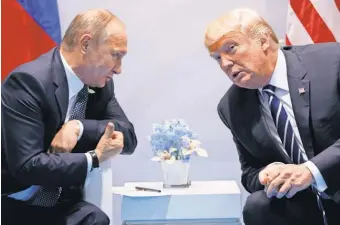  ?? EVAN VUCCI, AP ?? President Vladimir Putin and President Trump met Friday for more than two hours.