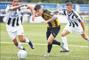  ?? FM4875540, above, FM4875561, below, FM4875638, left ?? Jack Paxman takes on two Maidenhead players, above, while, below, Joe Anderson made his debut. Left, celebratin­g the first league goal of the season