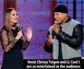  ??  ?? Hosts Chrissy Teigen and LL Cool J are as entertaine­d as the audience.