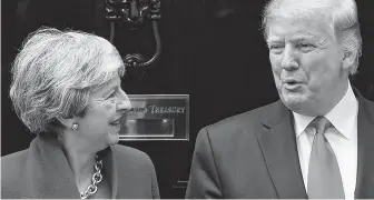  ?? Ben Stansall / AFP/Getty Images ?? Despite a friendly session with Prime Minister Theresa May in early June, President Donald Trump issued a broadside at her Tuesday over a British ambassador’s dim views of his antics.