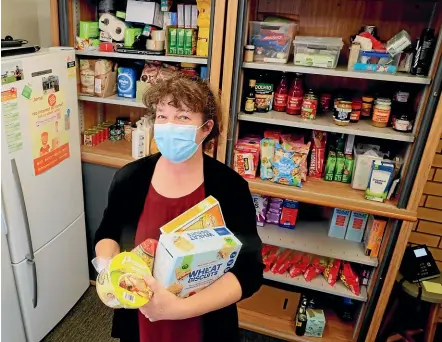  ?? MARK TAYLOR/STUFF ?? Morrinsvil­le’s Ezekiel Trust Budgeting and Food Bank is giving out around 10 food packages a day to those in need, manager Bronwyn O’Sullivan says.
